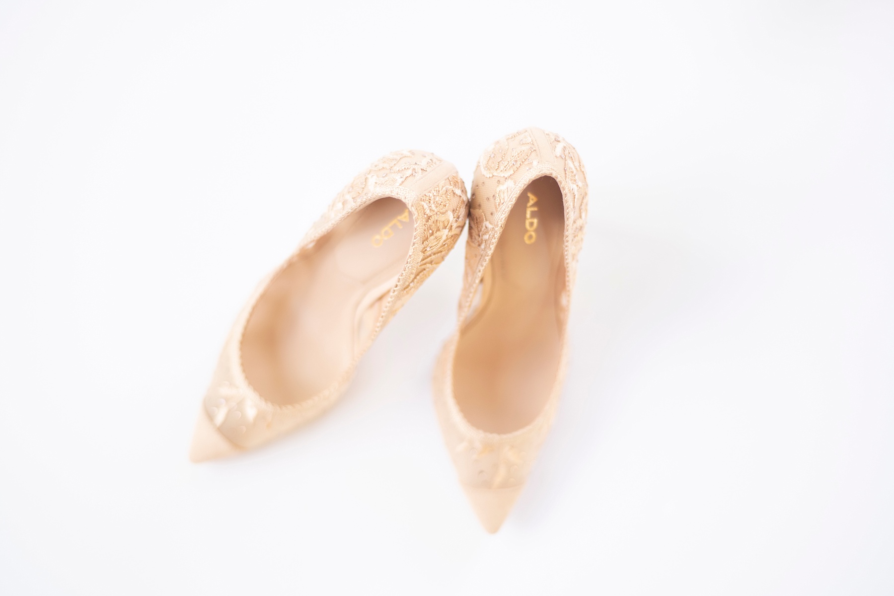 bride's wedding shoes photographed by Randi Michelle Weddings