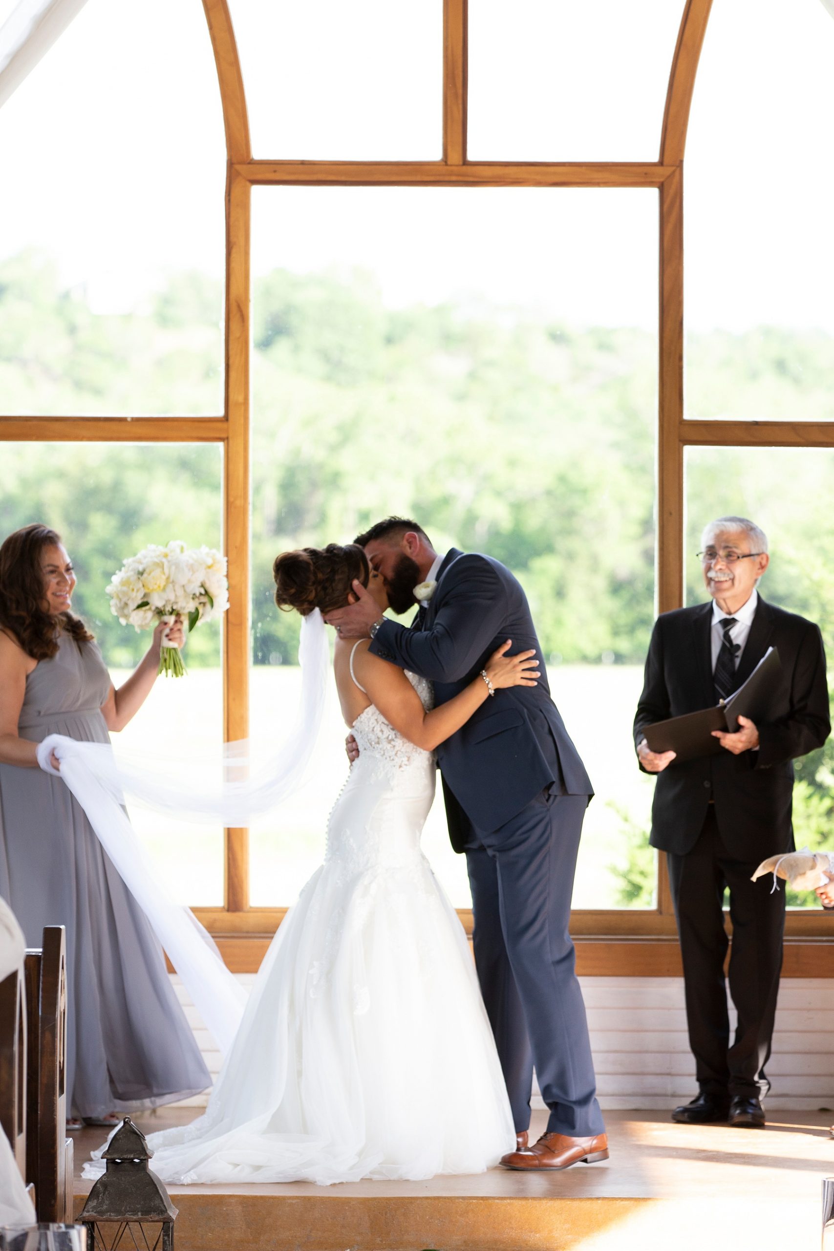 first kiss as husband and wife at the Brooks at Weatherford photographed by Randi Michelle