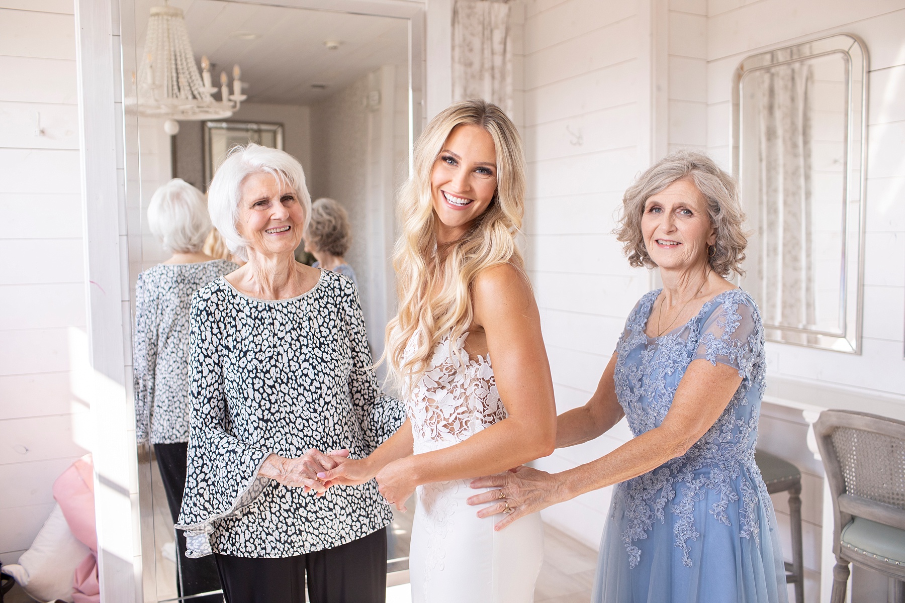 bride prepares for wedding day with mother and grandmother photographed by Randi Michelle