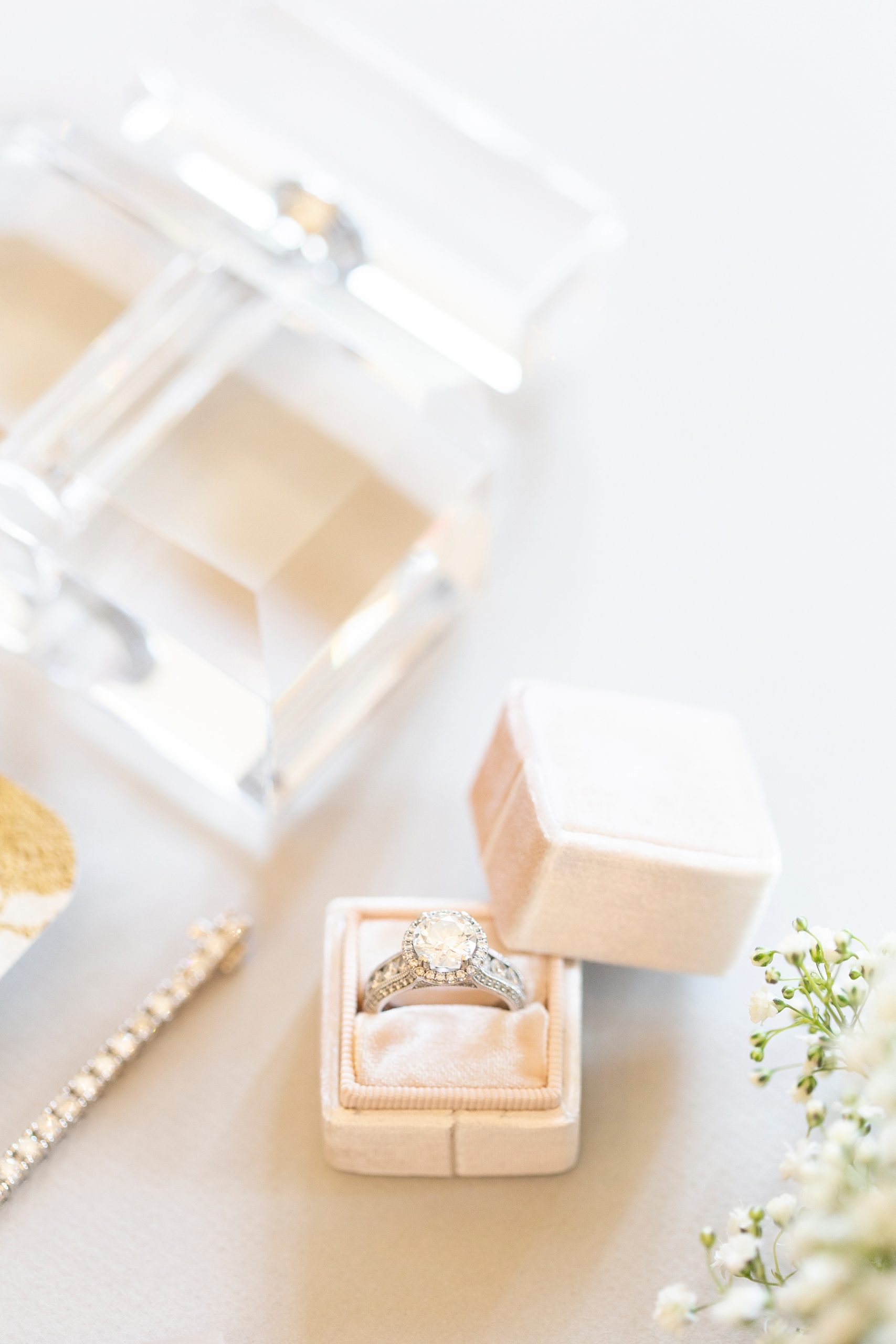 wedding ring in peach box photographed by Randi Michelle