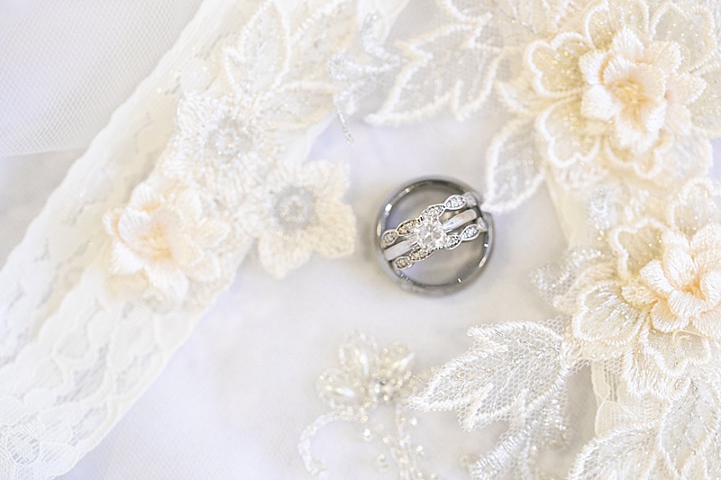 rings on bride's lace veil