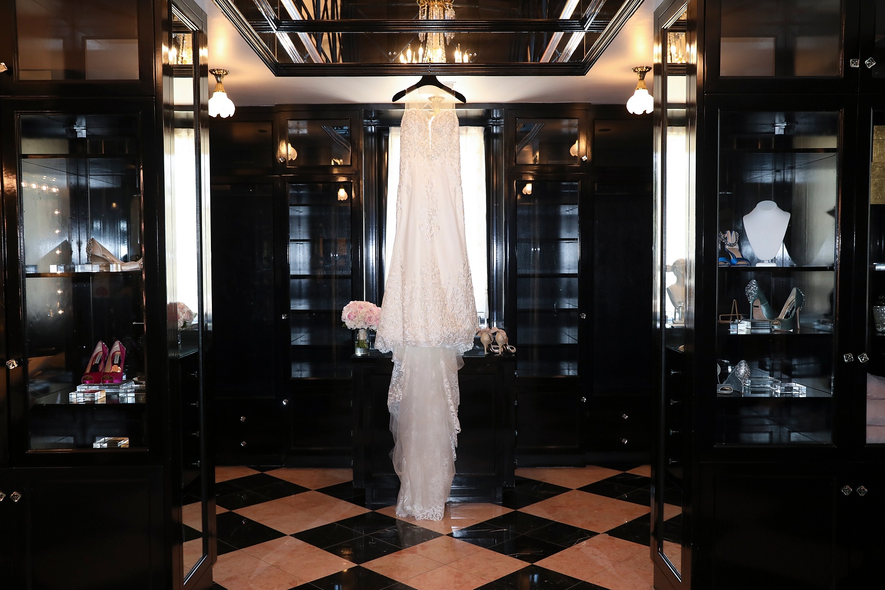 wedding dress hangs in suite at The Olana