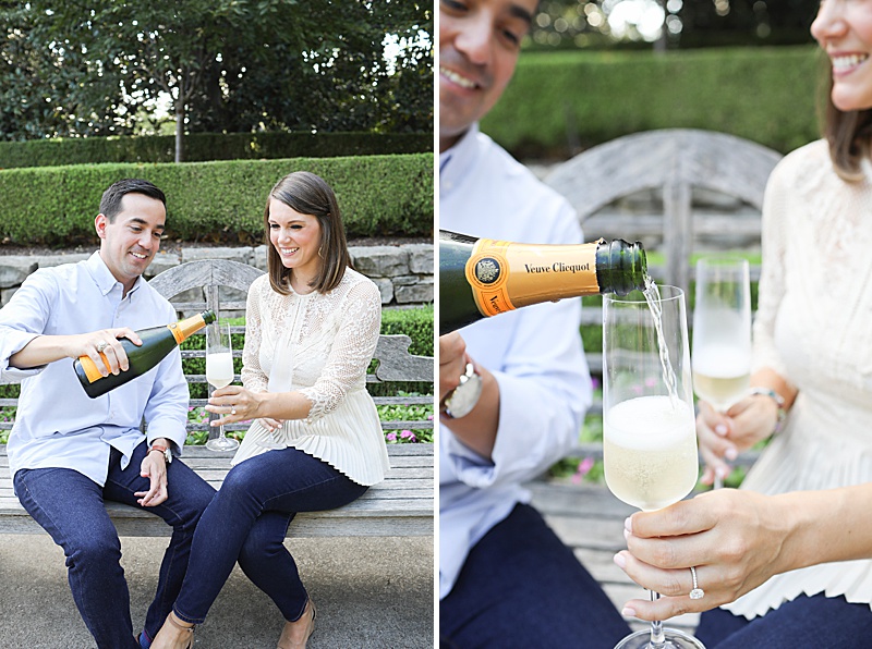 couple pops champagne for Dallas Arboretum engagement session