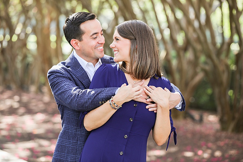 engagement session with couple in blue outfits