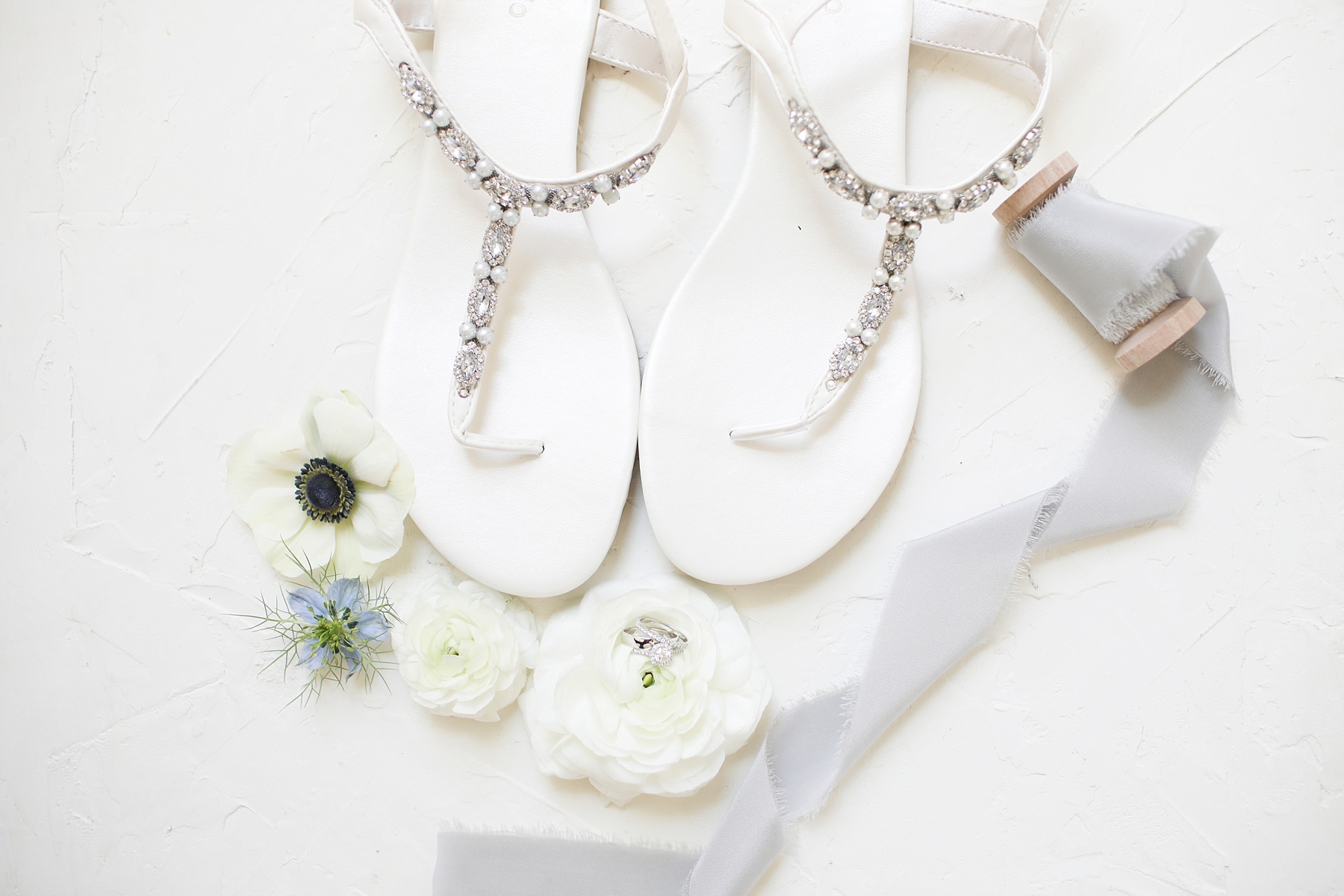 bride's sandals with grey ribbon