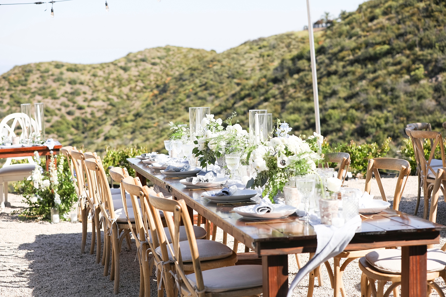 wedding reception with long farm table at Providence Plateau