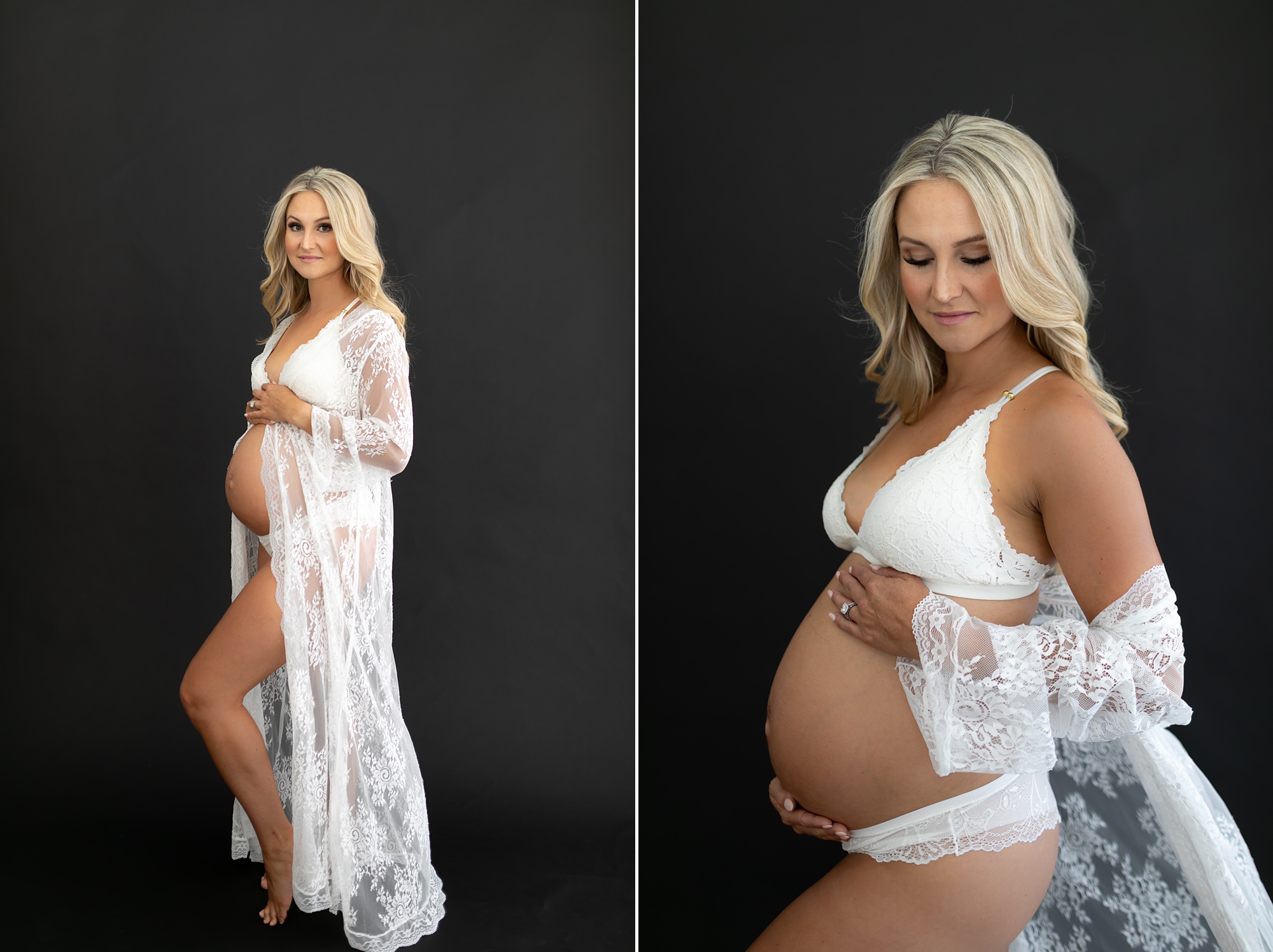 mom in lace robe holds baby belly in front of black backdrop
