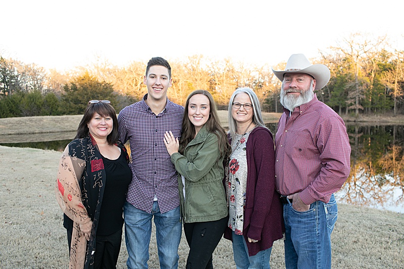 family celebrates couple's engagement in Texas