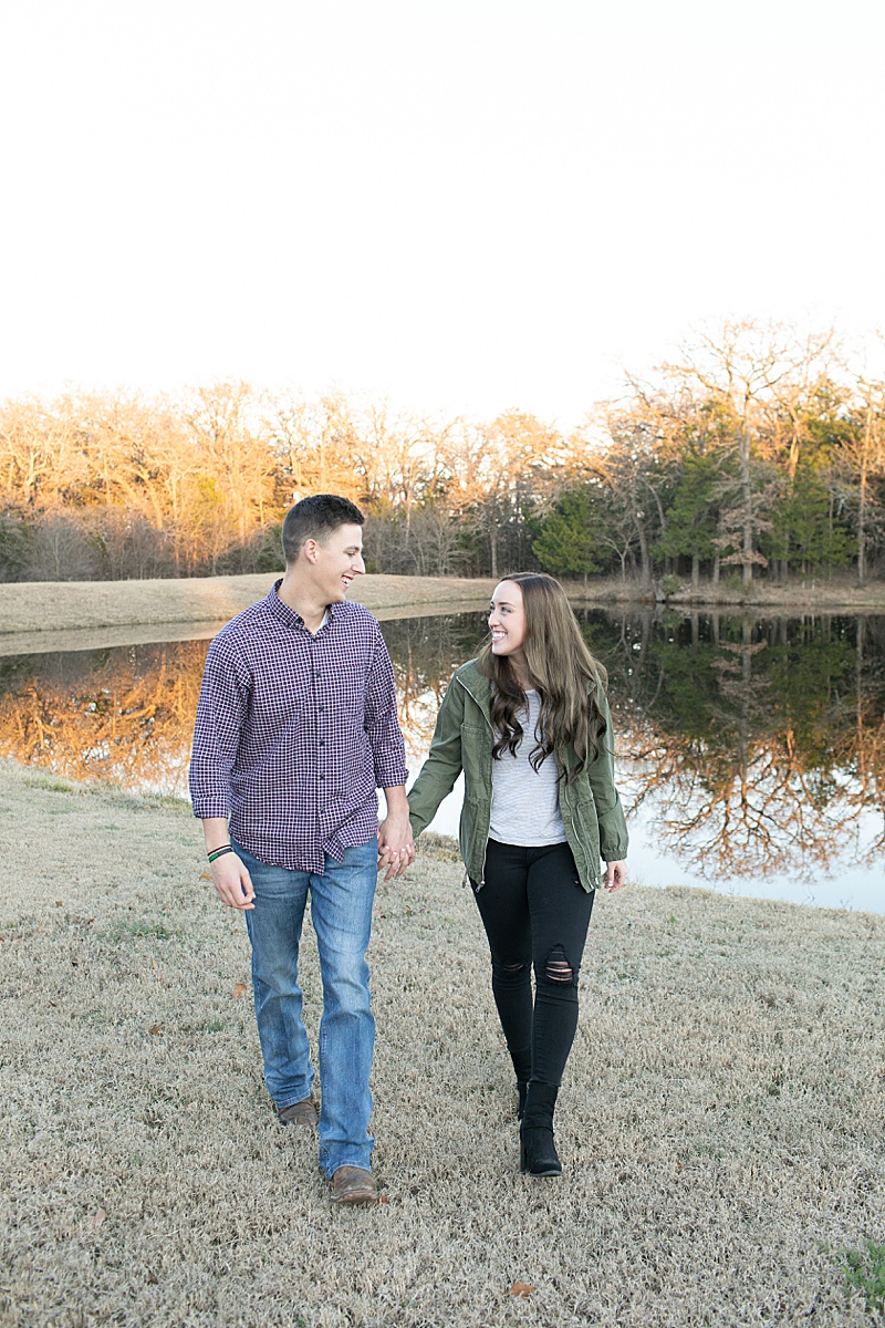 Texas couple walks along lake after proposal