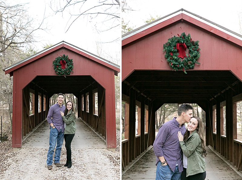 bride and groom pose at covered bridge after proposal