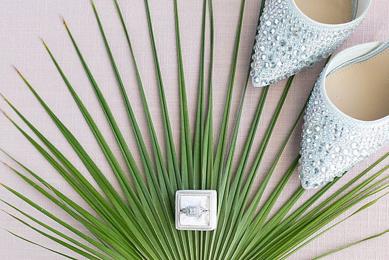 wedding rings on palm leaf in Mexico