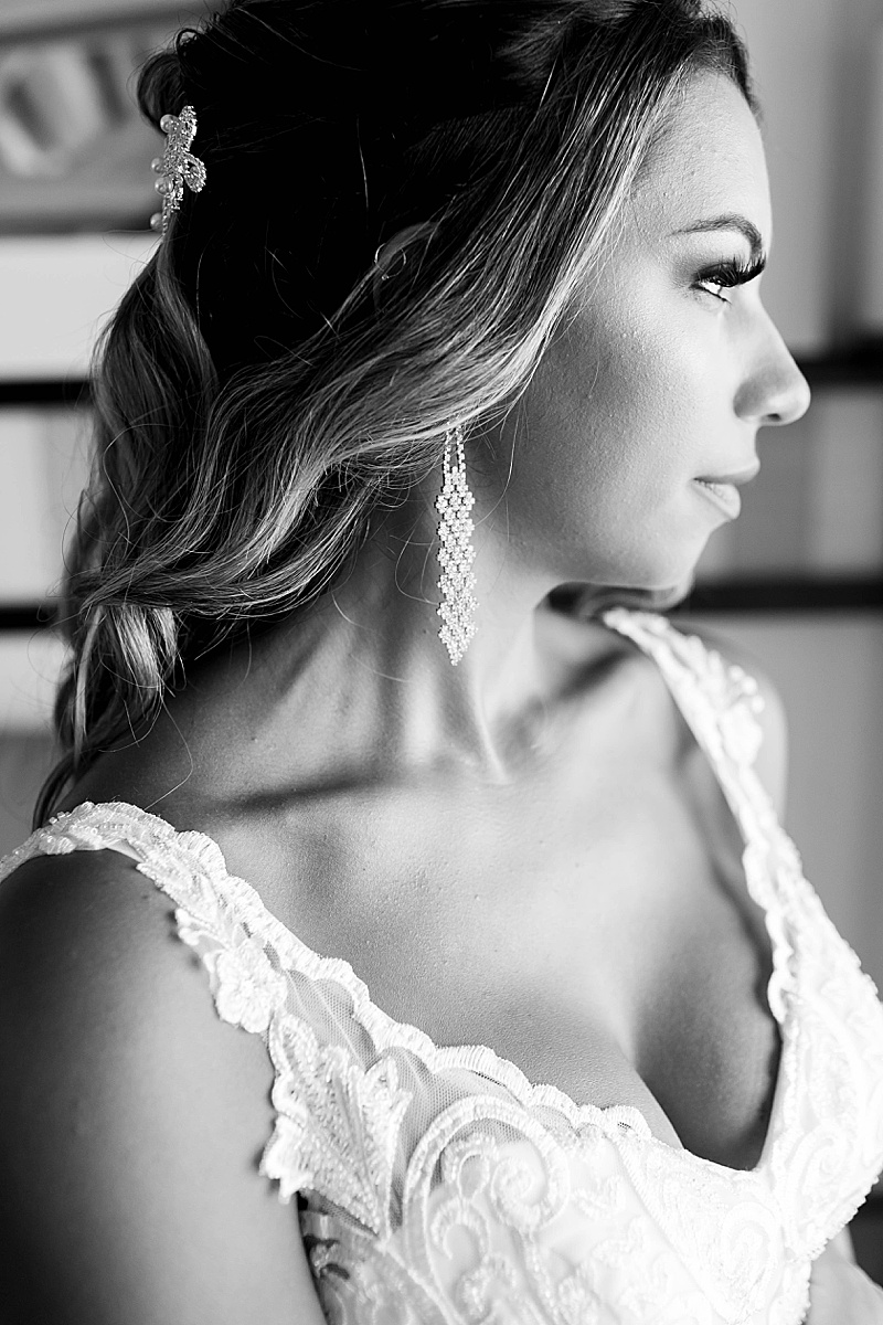 black and white bridal portrait in hotel room