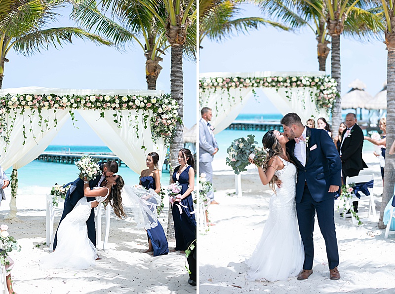 bride and groom kiss after getting married on beach