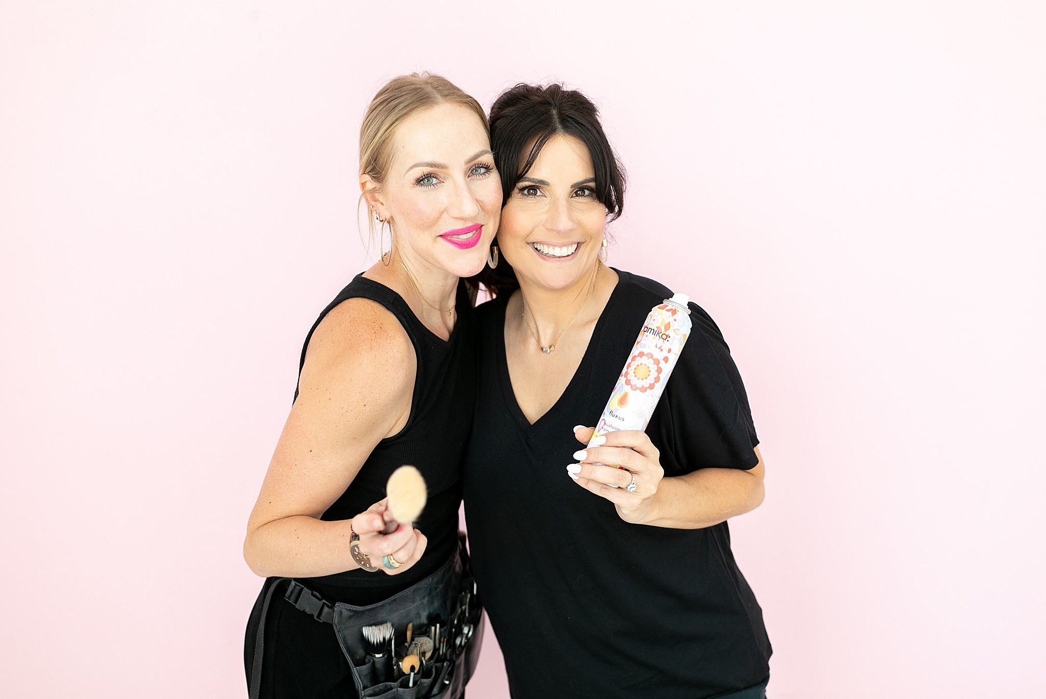 owners of Brite Beauty pose during commercial branding session