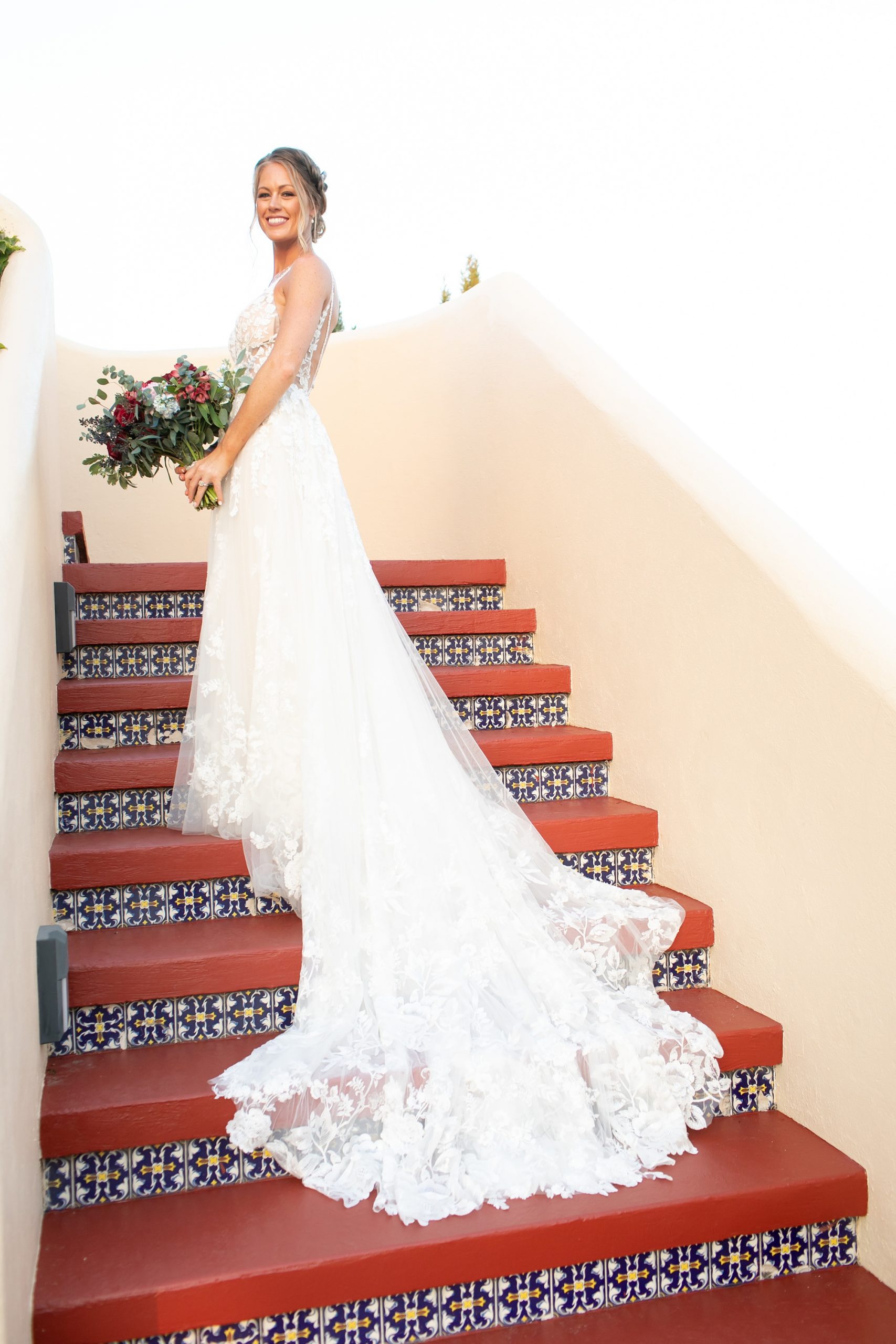 bride walks up stairs at Stoney Ridge Villa
