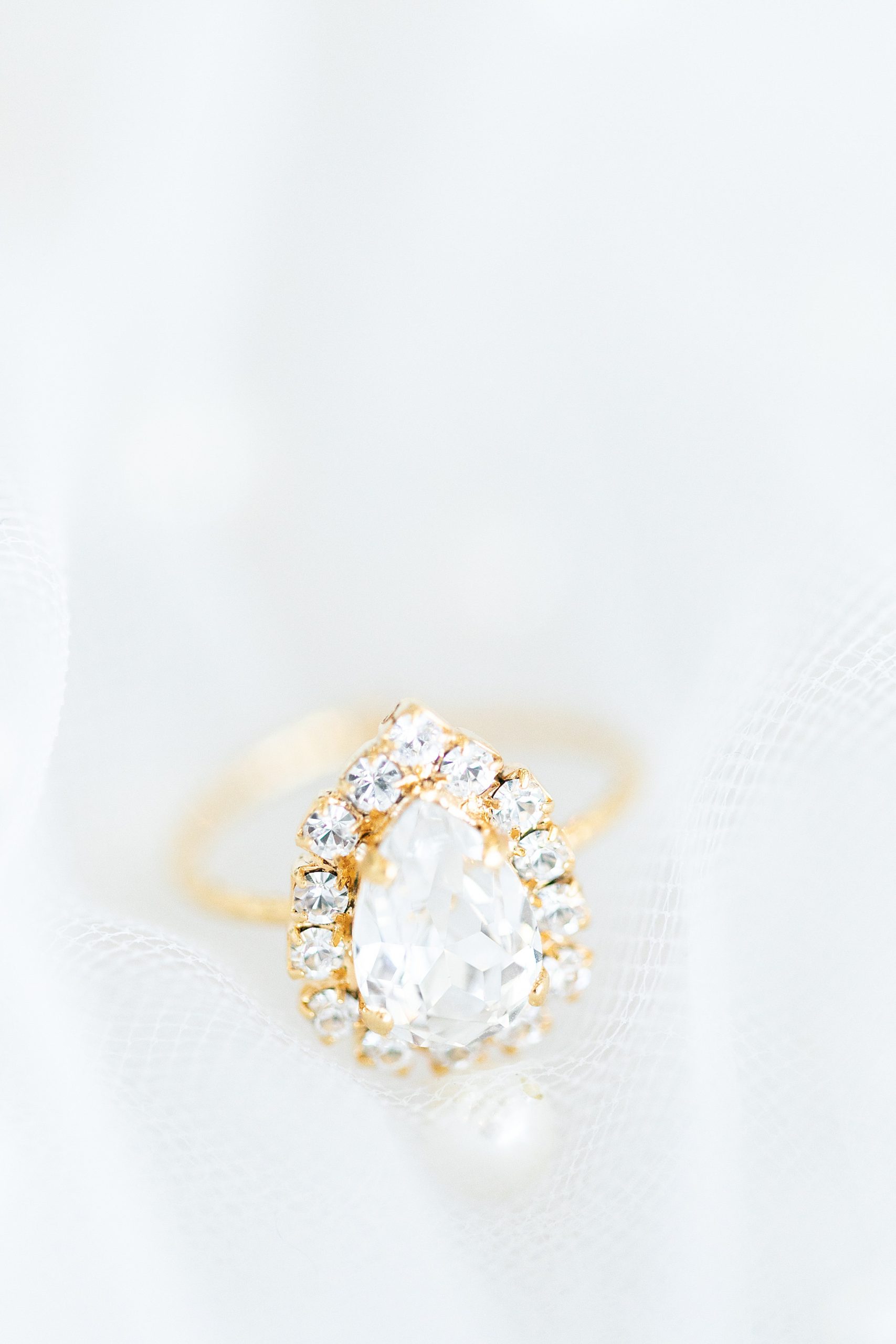 bride's pear shaped ring with diamonds