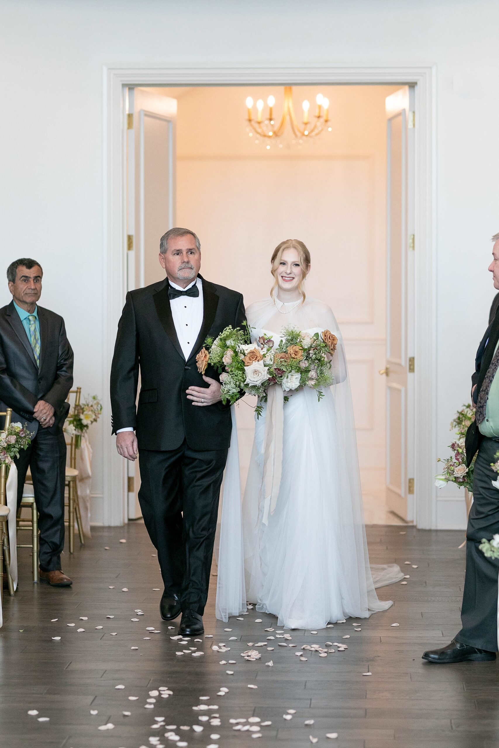 father walks bride down aisle for ceremony at the Hillside Estate 