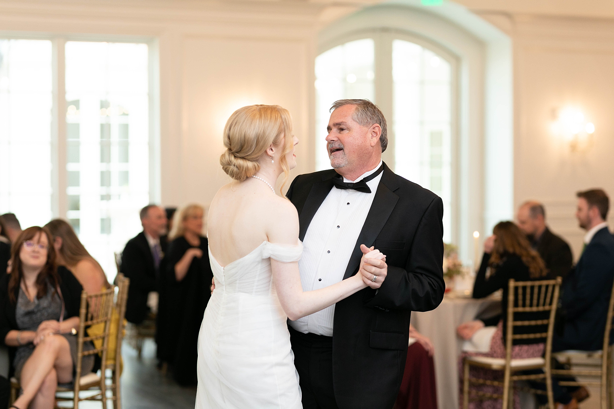 bride dances with dad during Denton TX wedding reception