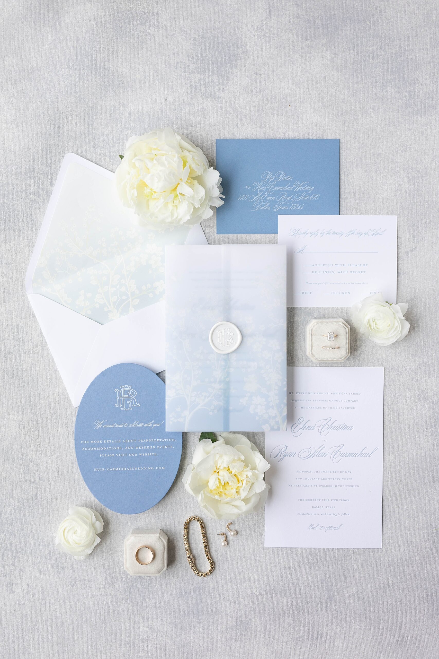 blue and white invitations for the Hotel Crescent Court wedding day