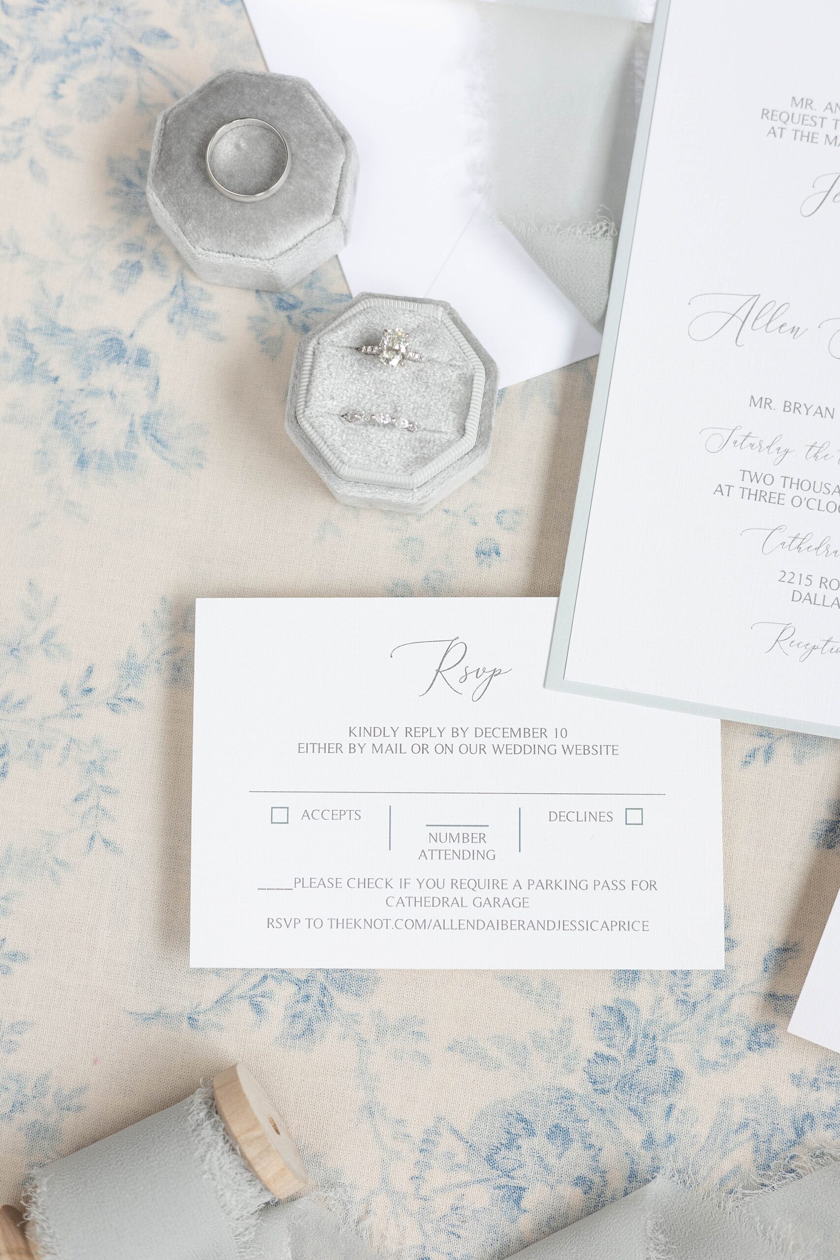RSVP card from invitation suite with silver and blue detailing 