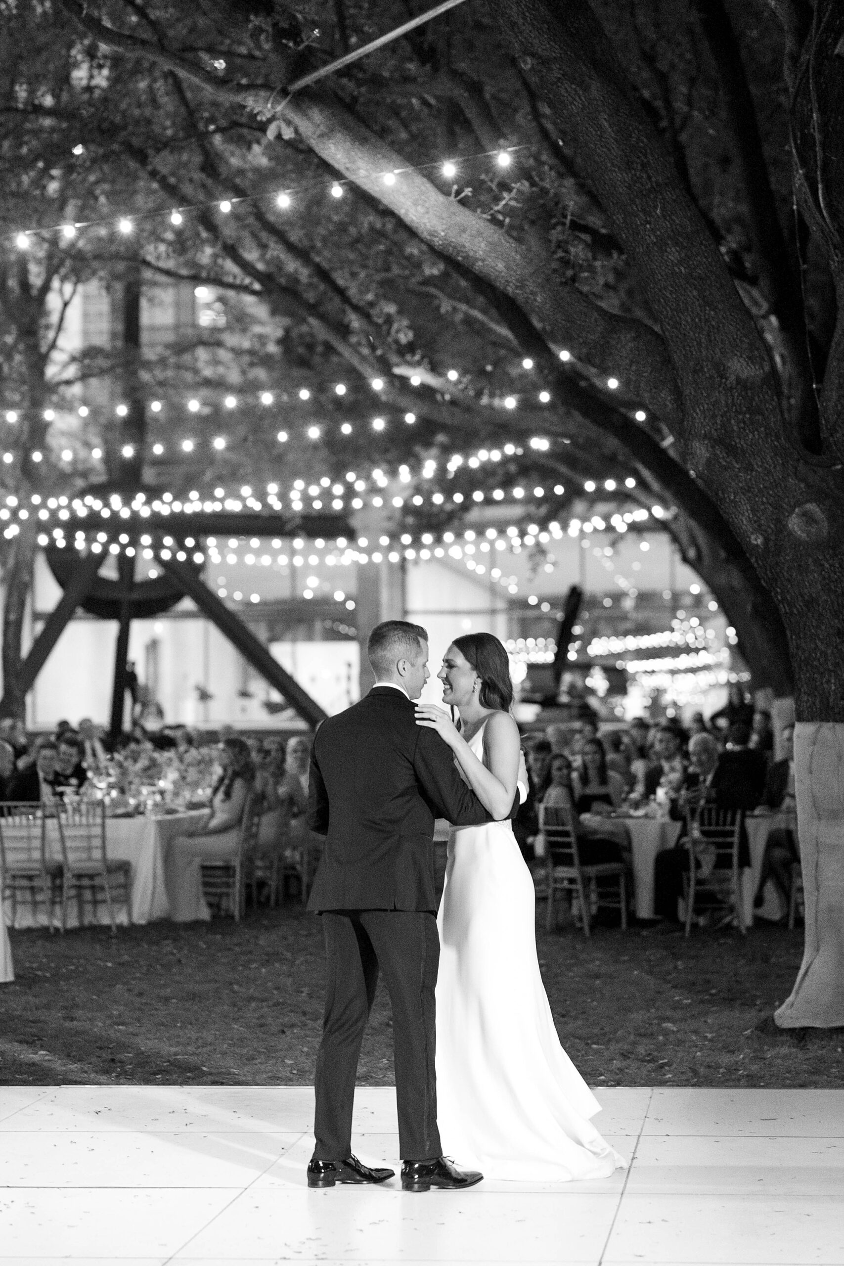 bride and groom dance during al fresco wedding reception at the Nasher Sculpture Center