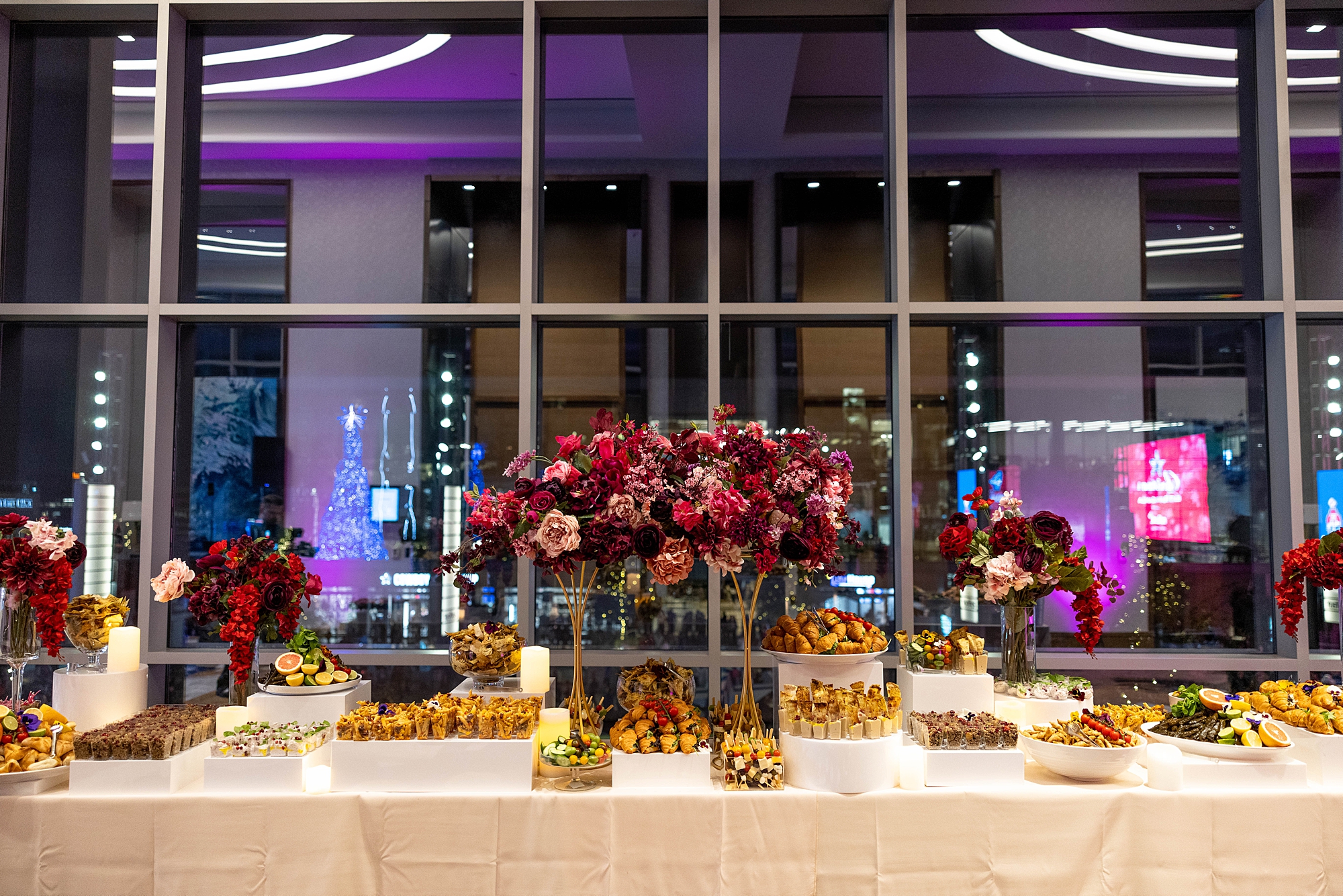 dessert table in front of windows at the Omni Frisco at the Star