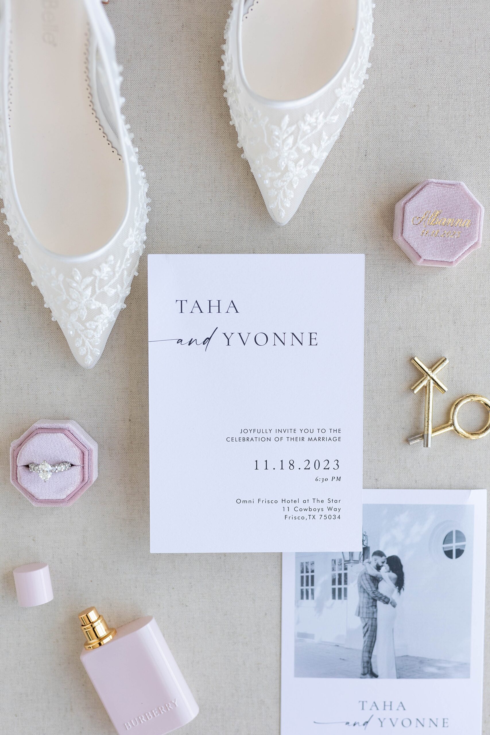 invitation suite with white shoes and pink ring box 