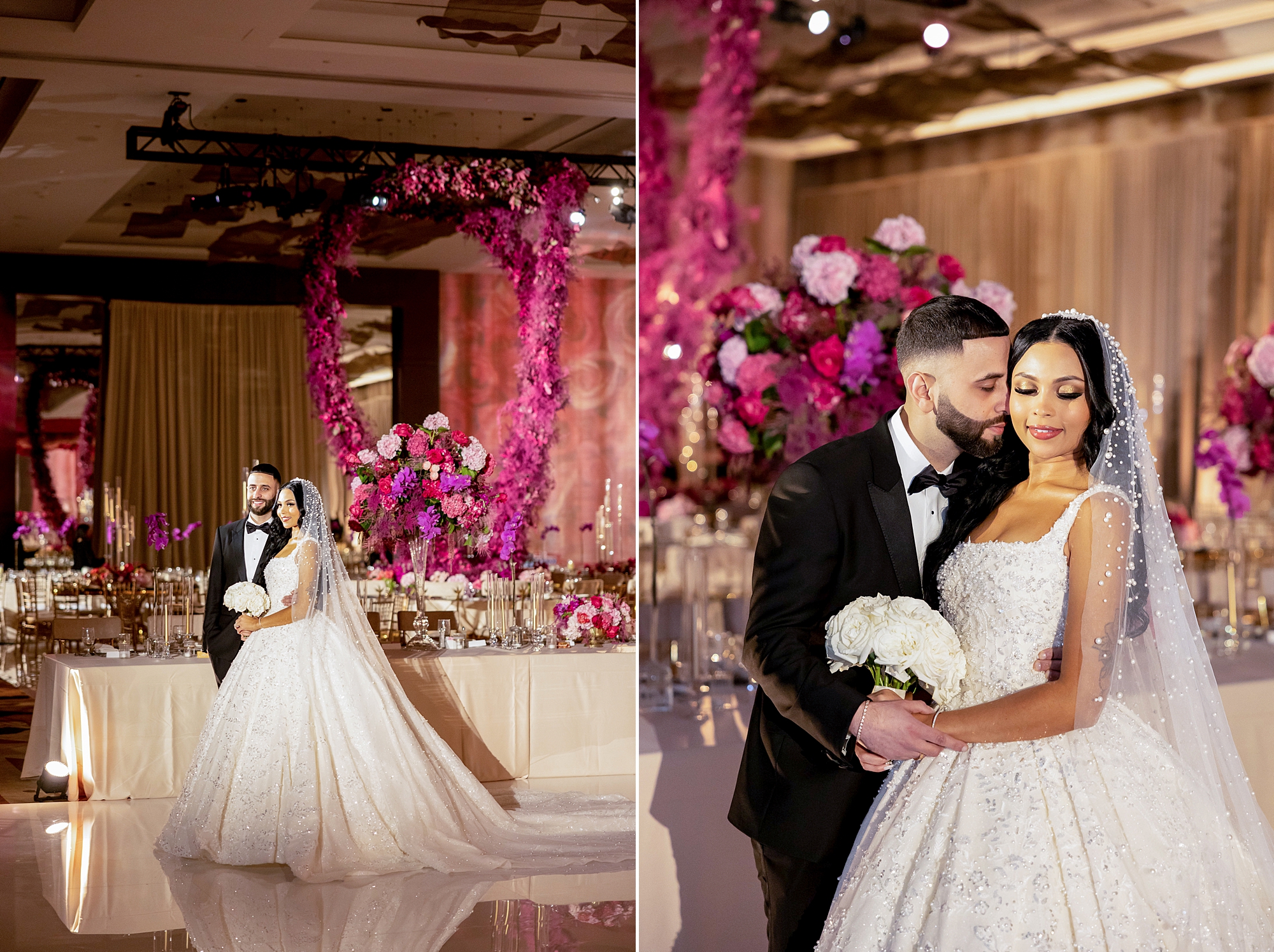 groom kisses bride's cheek by pink floral installation 